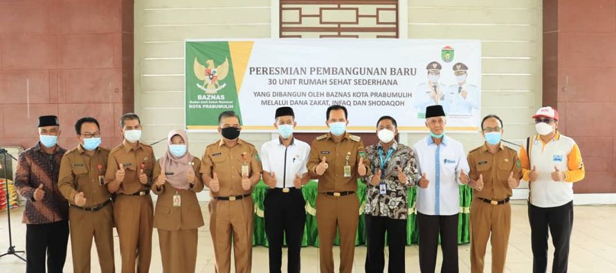 Walikota Prabumulih Ir. H . Ridho Yahya, MM Menyalurkan Dana Zakat / Infaq Kepada Masyarakat Prabumulih